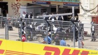 A very quick formula one pit stop during the Valencia Street Circuit race of the European Grand Prix