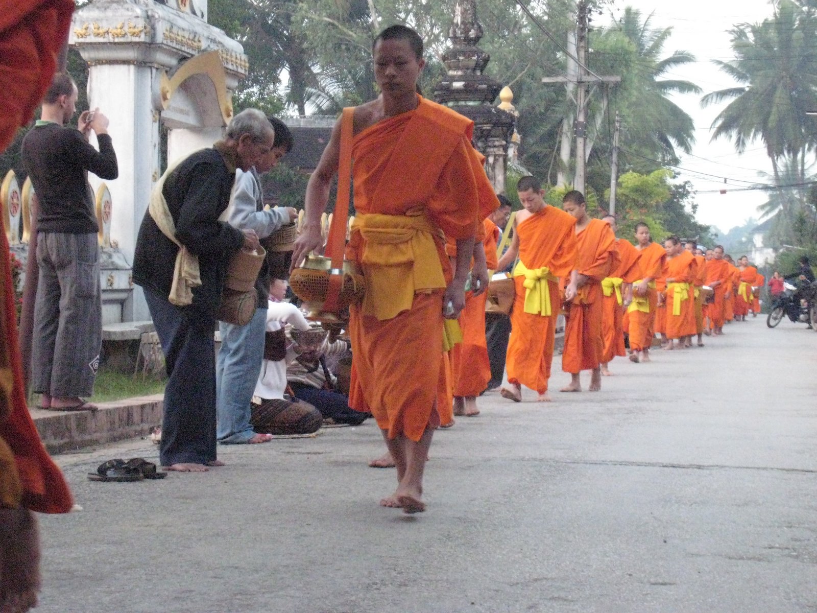 Four of our group woke up at 5:30 this morning and headed into town to participate in morning alms. All of the monks from all the temples in the area […]